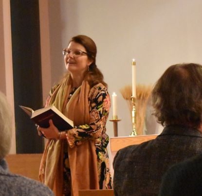 Christen Herman sings at a Harvest service